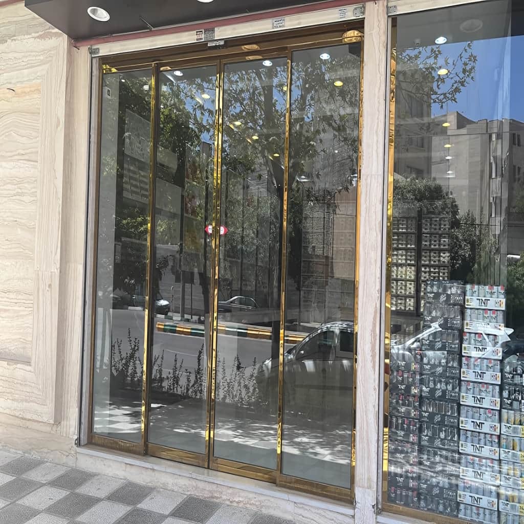 قیمت درب اتوماتیک شیشه ای پرتردد مجتمع با شیشه سکوریت در شیراز