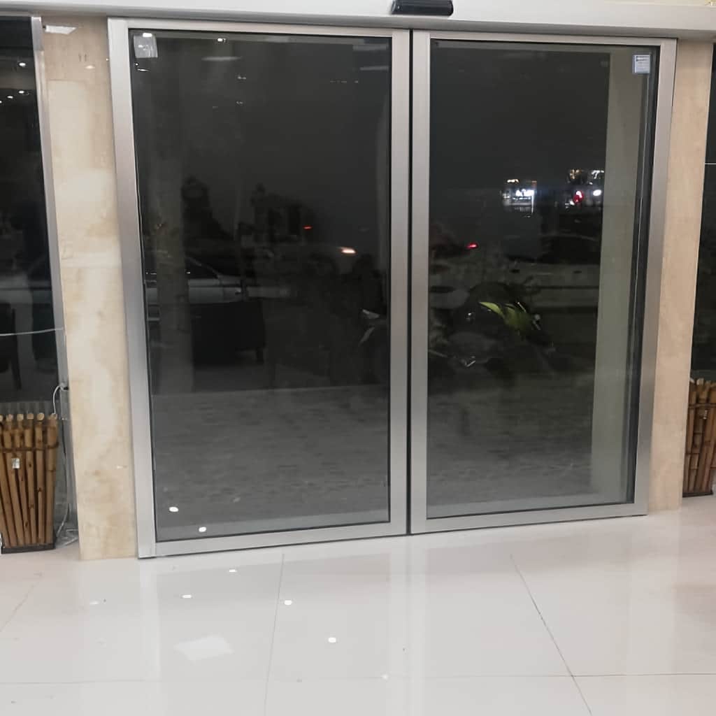سفارش درب شیشه ای اتوماتیک کشویی دو لت فریم دار در شیراز