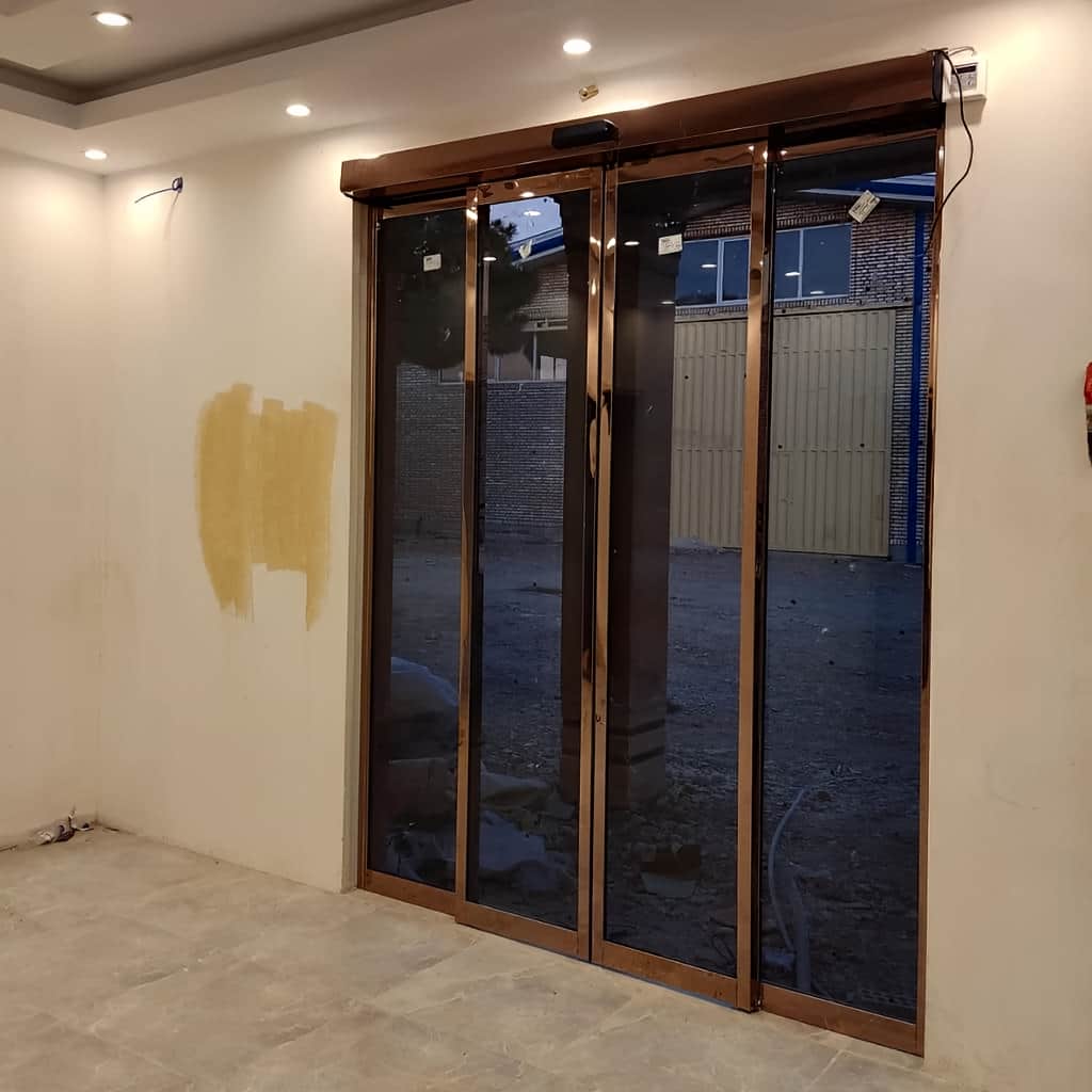 نصب درب اتوماتیک شیشه ای فریم دار آلومینیوم تلسکوپی در شیراز