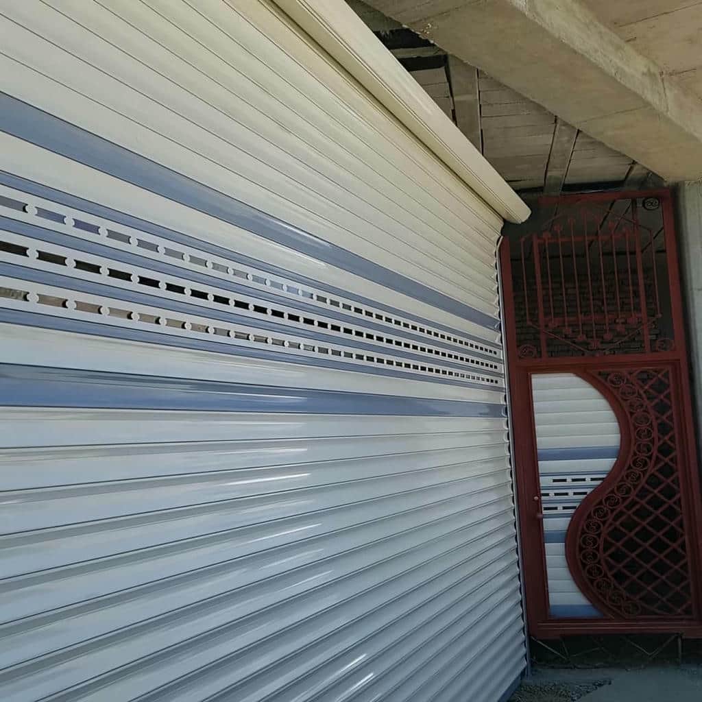 نصب درب کرکره ای پارکینگ اتوماتیک برای ورودی خودرو در شیراز