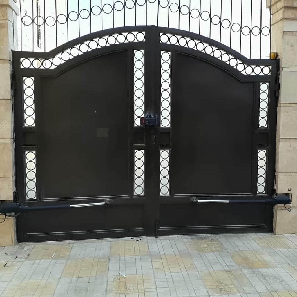 قیمت جک درب پارکینگ لولایی شفت بلند متناسب با شرایط در شیراز